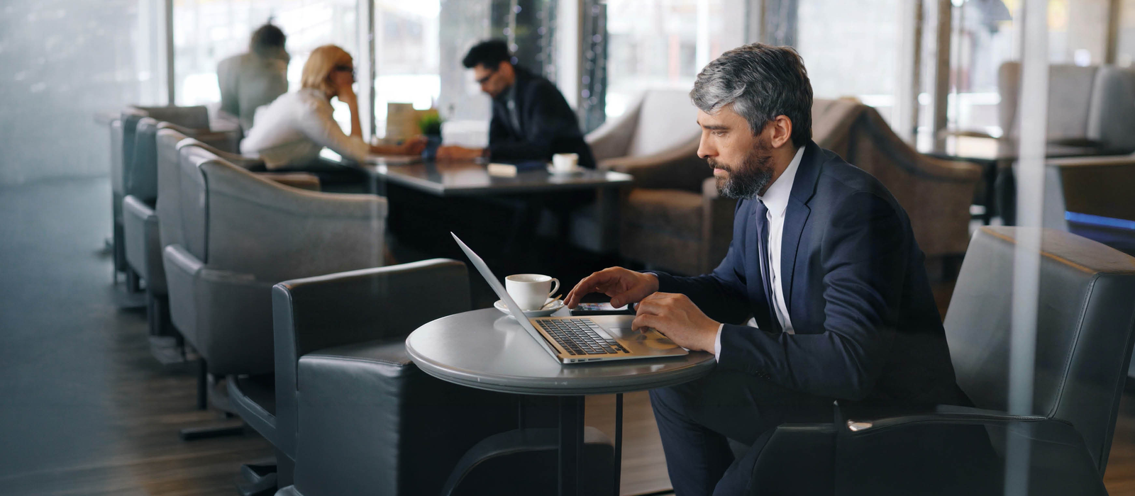 Person reviewing documents at a desk